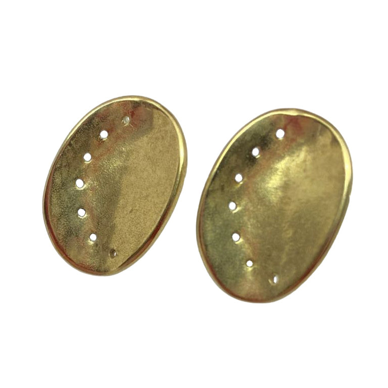 Pair of gold guernsey ormer shell earrings on a white background