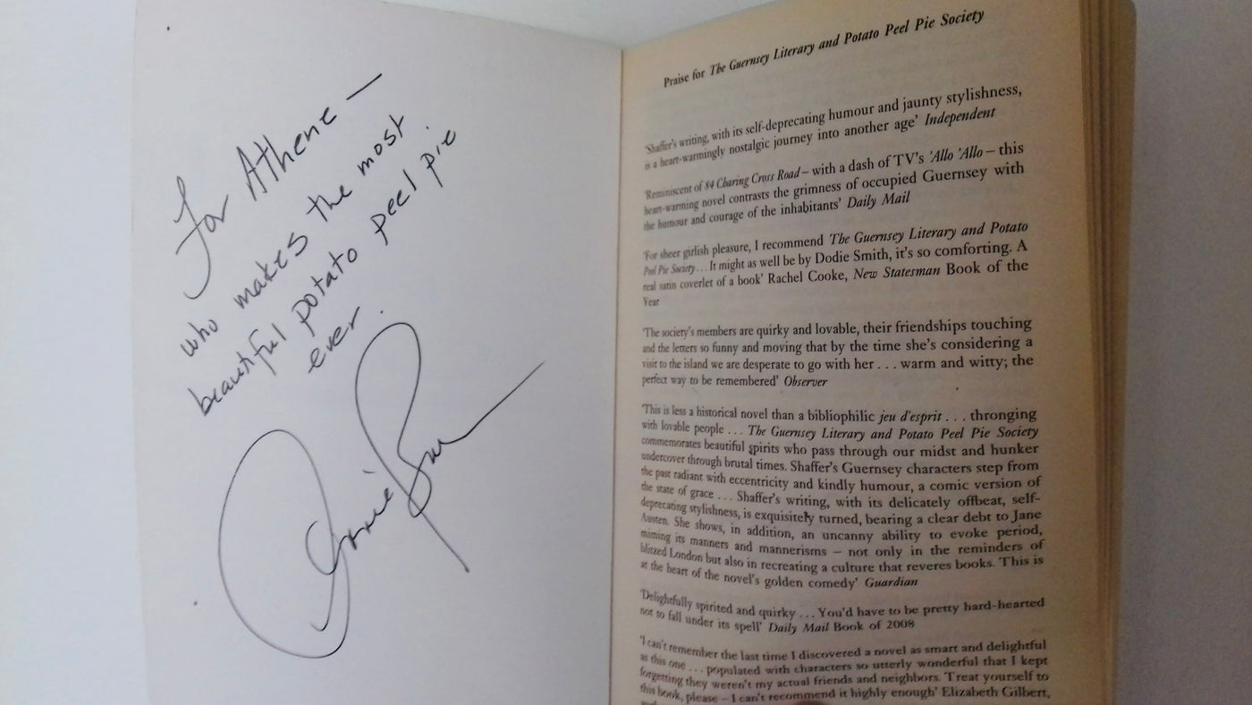 Signed book with a message and signature from Annie Barrows author on a white background