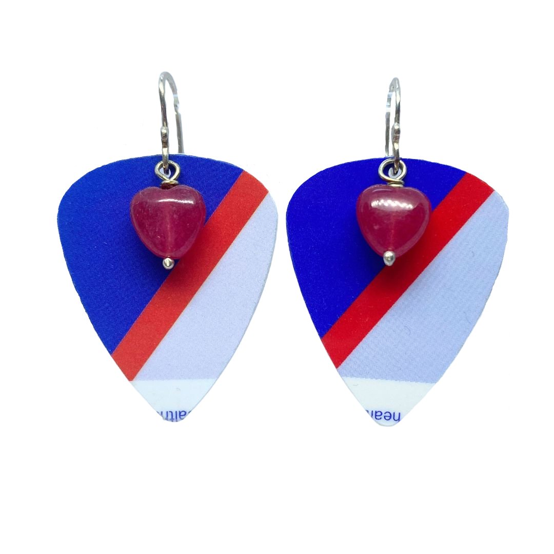 Guitar pick-shaped earrings with red heart beads on a white background