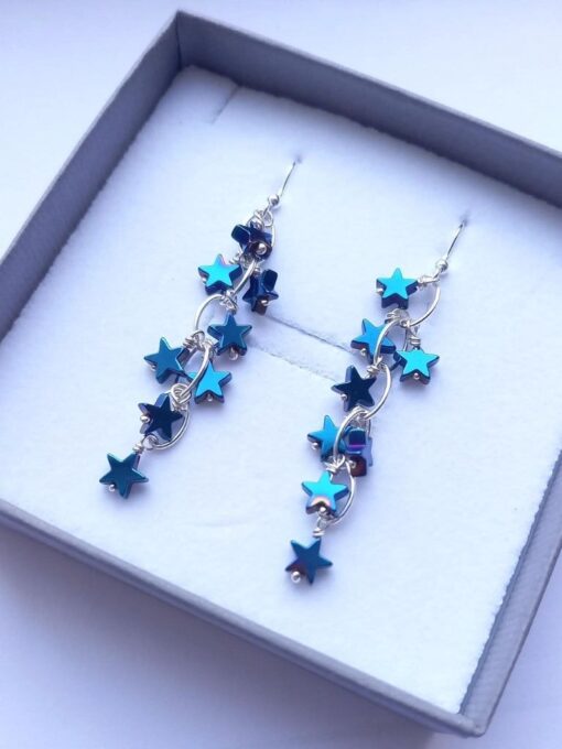 Blue Hematite Star Waterfall Earrings presented in our grey ribbed gift box