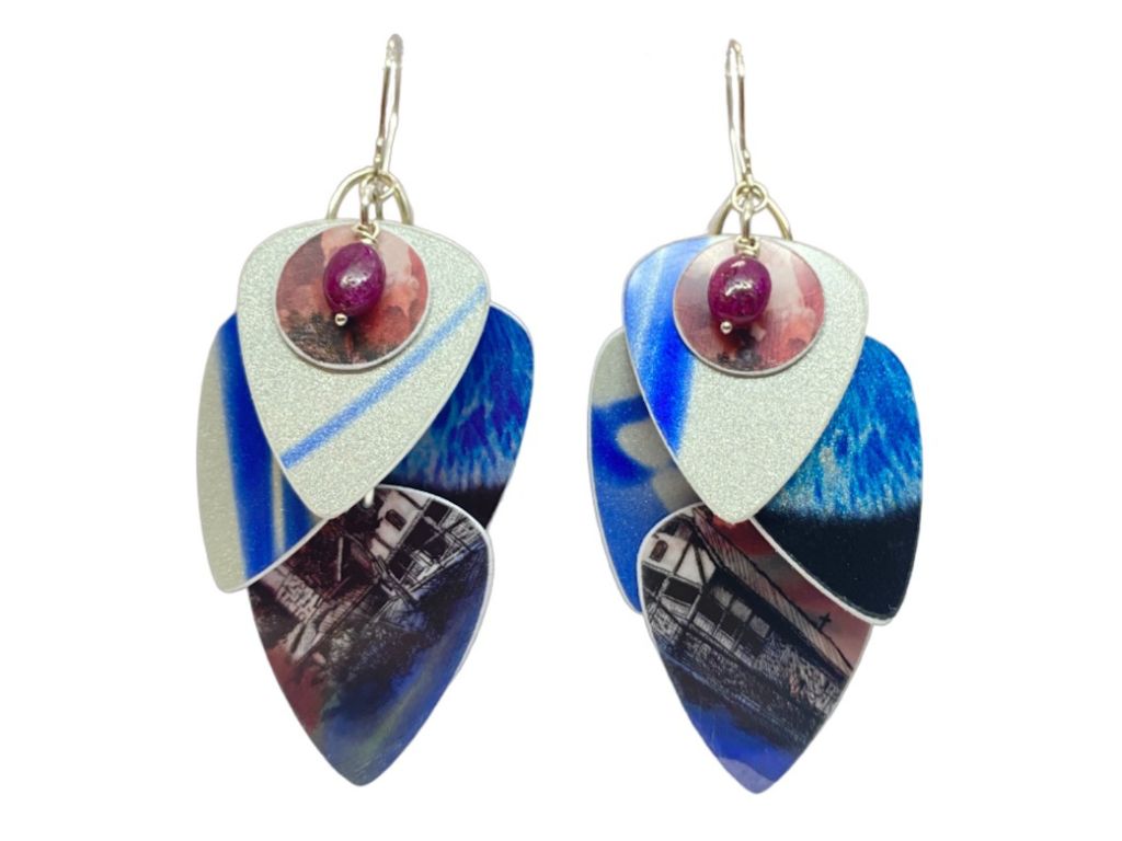 Chain link earrings with 4 blue and red guitar picks. With a read circle and ruby at the top of the earrings.